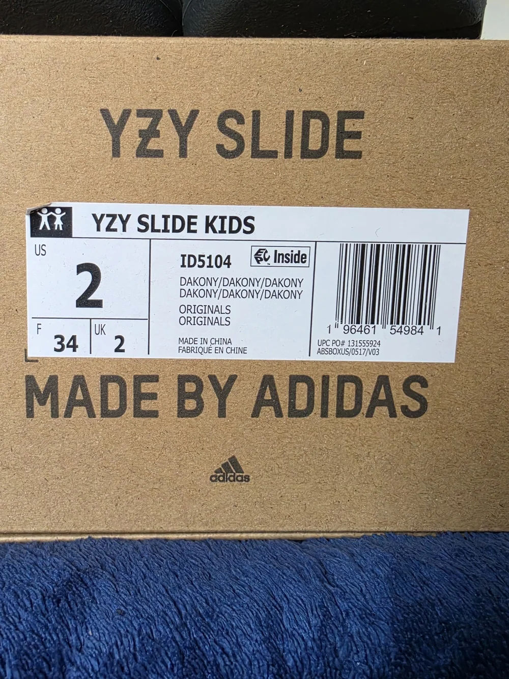 Adidas Kids Yeezy Slides.